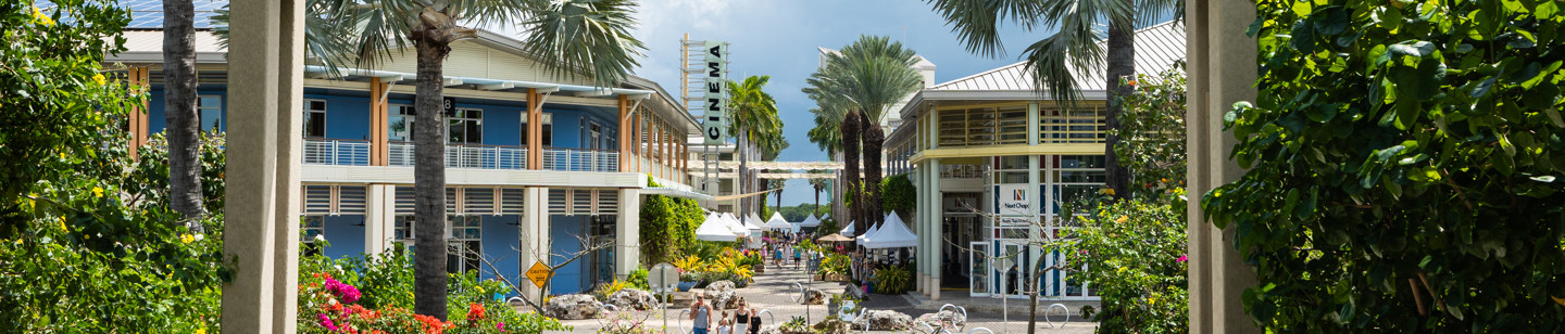 Entrance to Camana Bay leading towards shops and cinemas