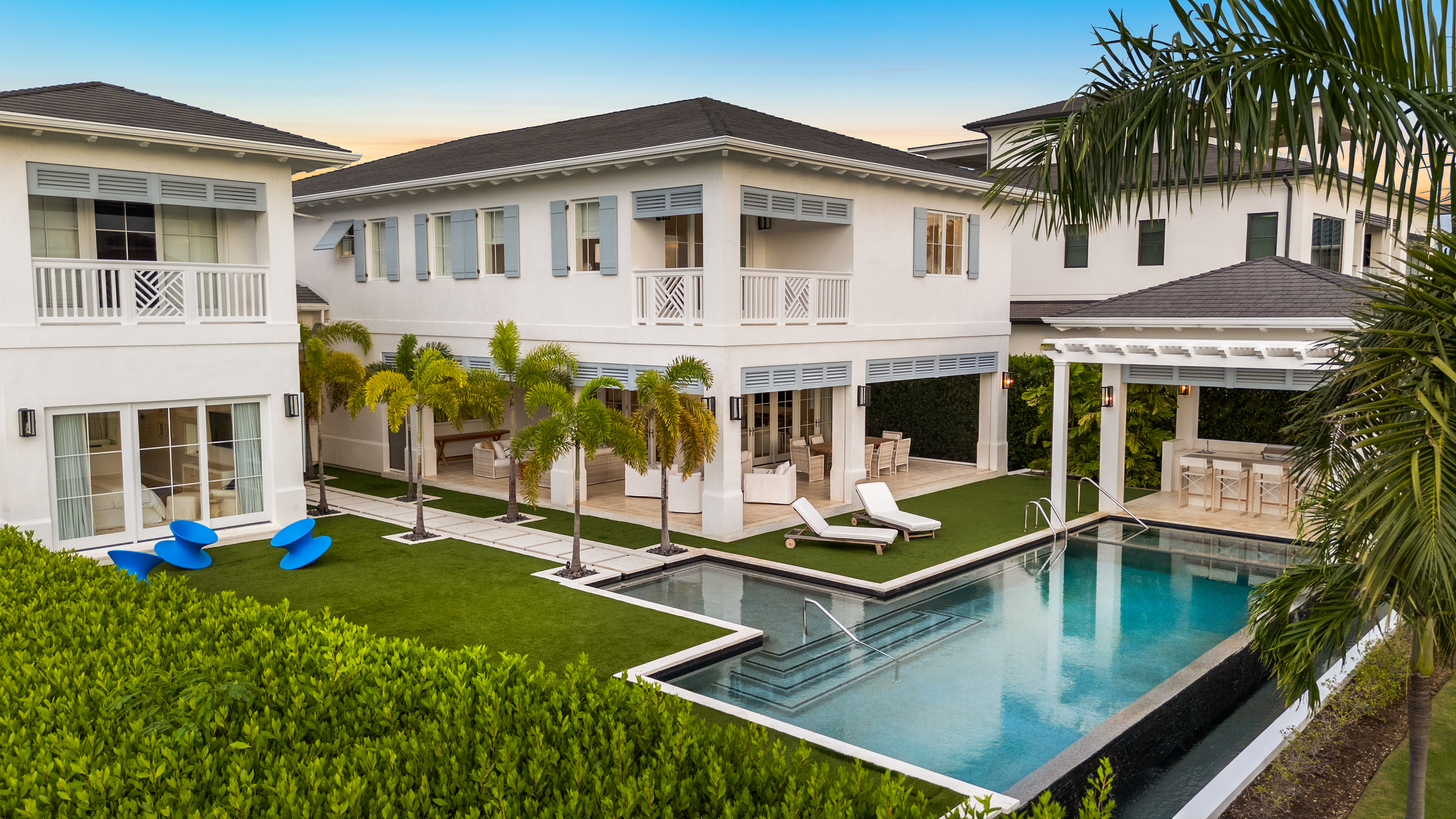 House with art deco furniture and swimming pool with trees