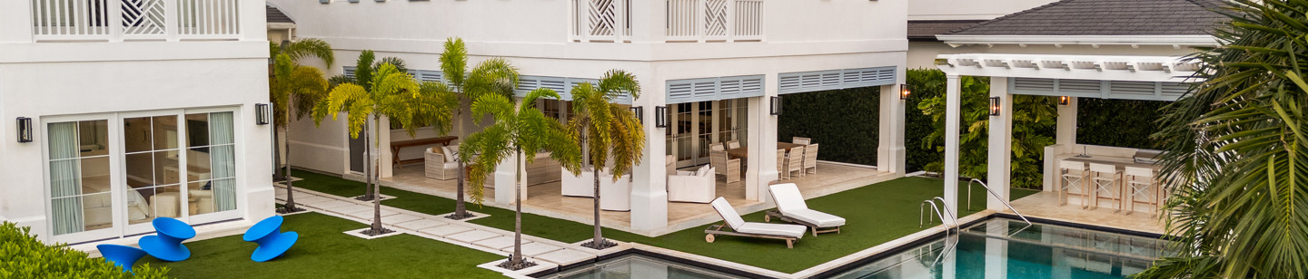 House with art deco furniture and swimming pool with trees