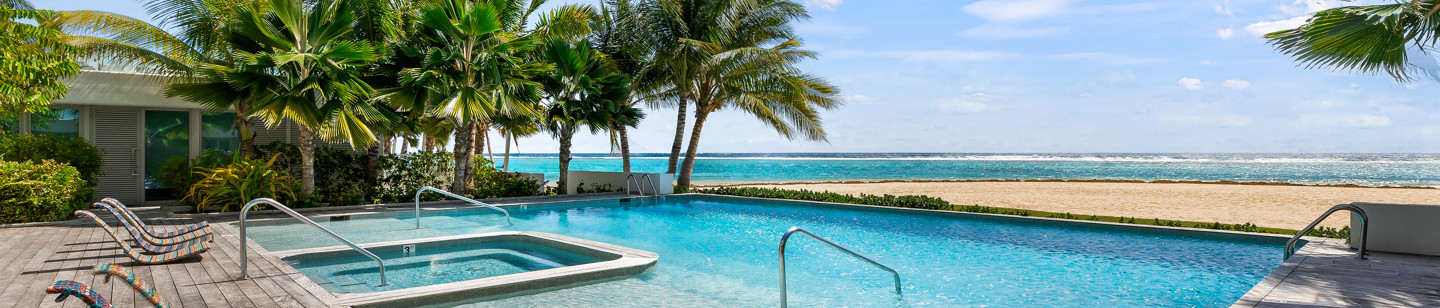 Large Infinity Pool With Palm Trees Blue Sea